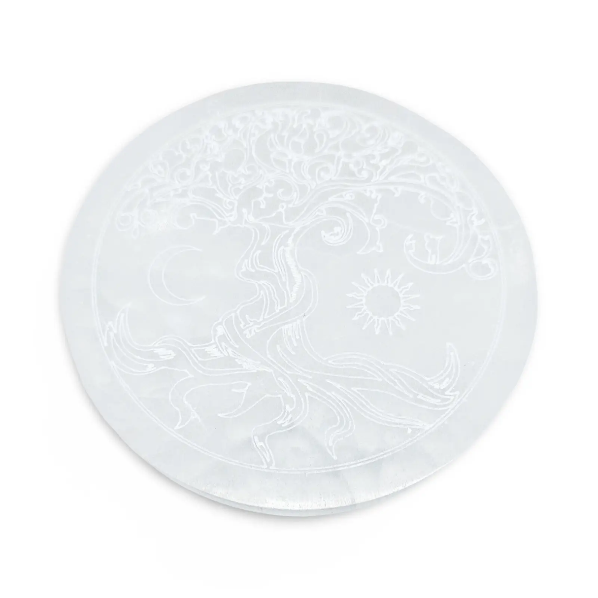 Selenite charging plate by Pür Sérénité featuring a tree of life with moon and sun