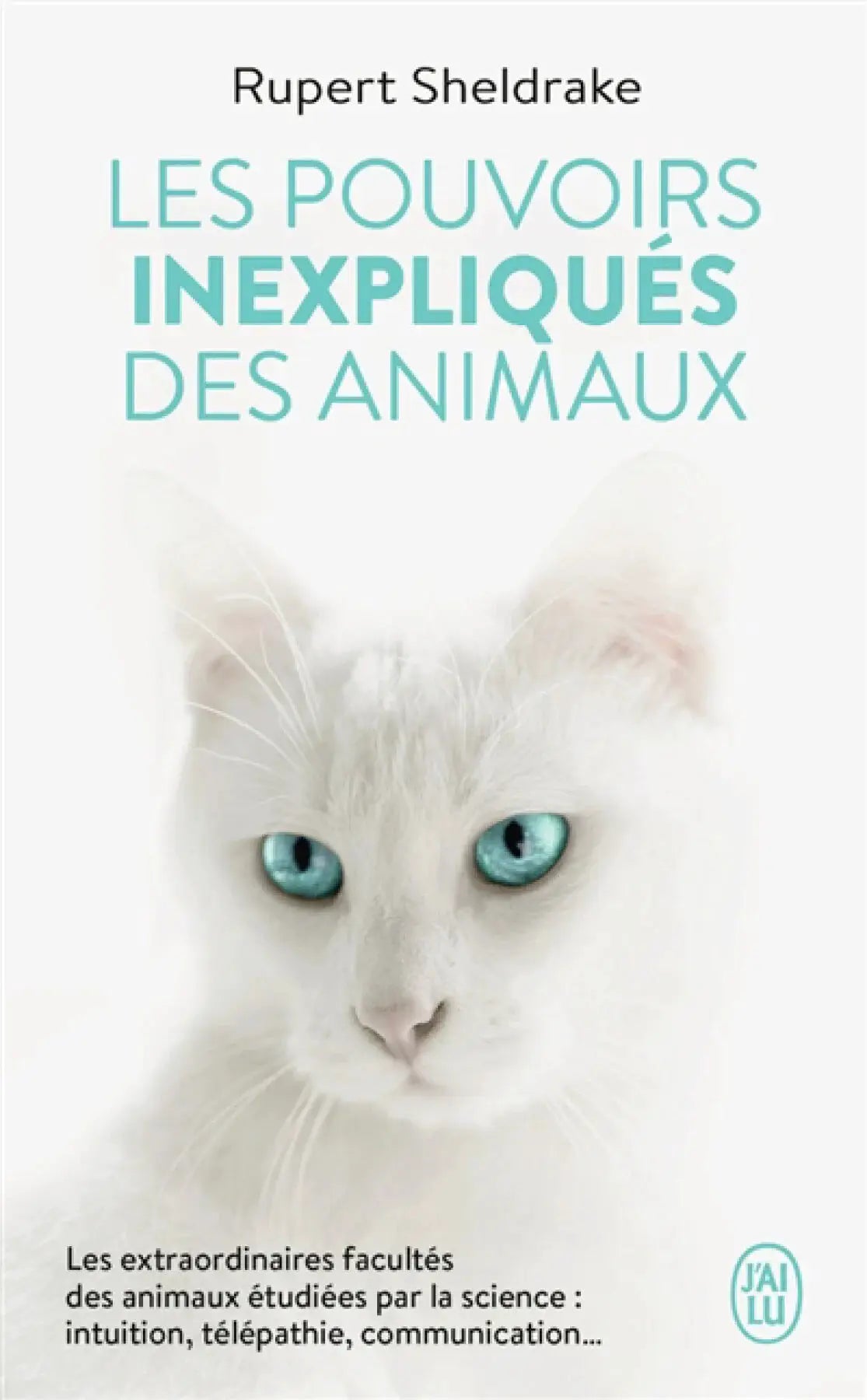 Livre Le Pouvoir Inexpliqués des Animaux, a print book by Pür Sérénité; white cat with turquoise eyes on the cover.