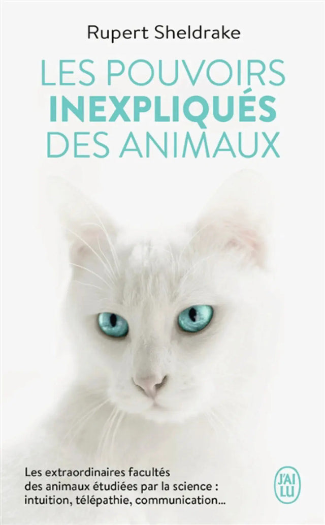 Livre Le Pouvoir Inexpliqués des Animaux, a print book by Pür Sérénité; white cat with turquoise eyes on the cover.