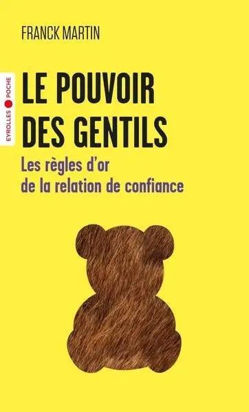 Livre imprimé Le Pouvoir des Gentils, couverture jaune avec silhouette d'ours brun