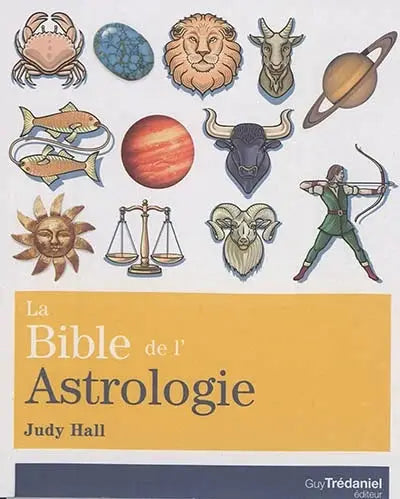 Livre La Bible de l'Astrologie par Judy Hall, édition Guy Tredaniel, couverture jaune avec symboles astrologiques