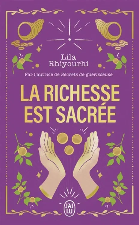 Livre La Richesse Est Sacrée – couverture violette, mains dorées et pièces, logo J'ai Lu