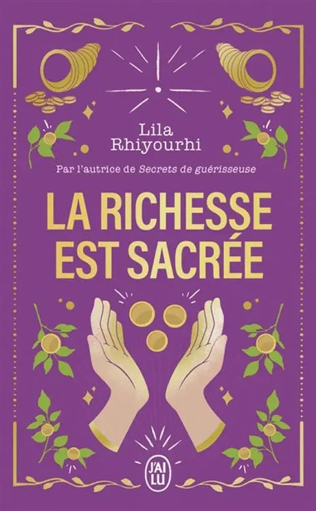 Livre La Richesse Est Sacrée – couverture violette, mains dorées et pièces, logo J'ai Lu