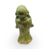 Green ceramic Happy Buddha figurine with crackled glaze texture by Pür Sérénité.