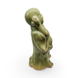 Green ceramic Happy Buddha figurine for home decor.